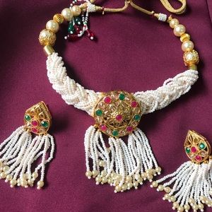 Handmade beaded choker and earrings set.